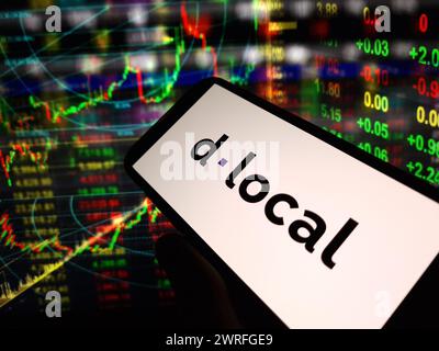 Konskie, Poland - March 11, 2024: dLocal company logo displayed on mobile phone Stock Photo