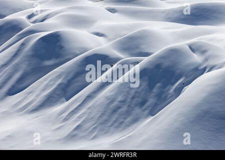 Pristine untouched snow on rolling hills Stock Photo