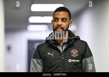 CJ Hamilton of Blackpool arrives at Sixfields Stadium prior to the Sky ...