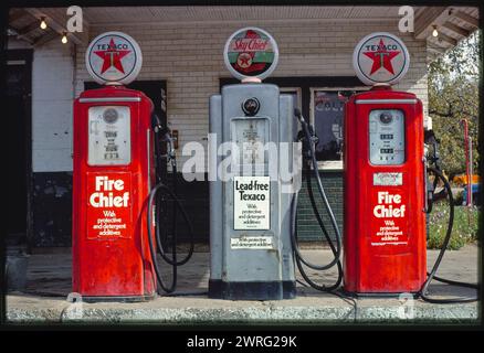 Vintage Texaco gas pumps, at gas station. Milford, Illinois. Vintage Americana Photography.  Roadside Attractions.   USA 1970s Stock Photo