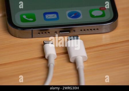The new iPhone has a new type-c model charger that no longer needs the old model charger.Moldova,Hincesti 04.09.2023 Stock Photo