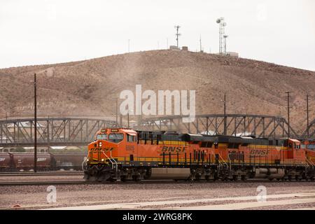Barstow, California, USA - June 20, 2020: Trains pass through the heart of downtown Barstow. Stock Photo