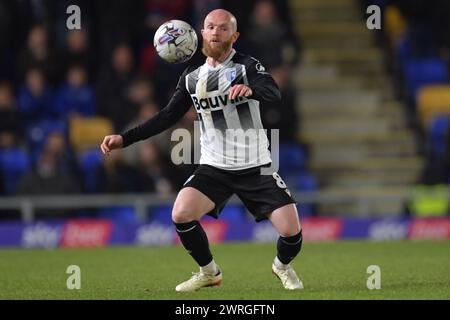 London, England. 12th Mar 2024. Omar Bugiel of AFC Wimbledon celebrates ...