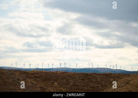 Wind Turbines on a onshore windfarm amongst gorgeous scenery of the Scottish Highlands, in Scotland, UK. Renewable energy at the heart of industry Stock Photo