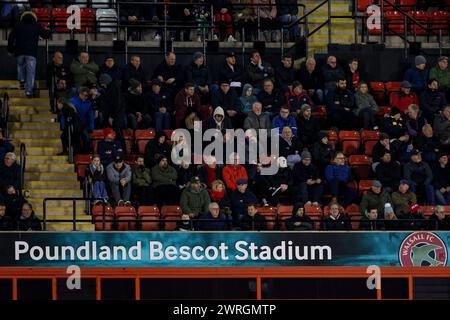 Walsall, UK. 12th Mar, 2024. Some of the 4700  spectators in attendance during the EFL Sky Bet League 2 match between Walsall and Barrow at the Poundland Bescot Stadium, Walsall, England on 12 March 2024. Photo by Stuart Leggett. Editorial use only, license required for commercial use. No use in betting, games or a single club/league/player publications. Credit: UK Sports Pics Ltd/Alamy Live News Stock Photo