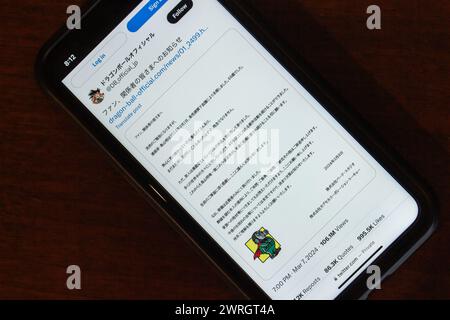 Announcement of the passing of Akira Toriyama, famous artist of Manga such as Dragon Ball, Dr. Slump, seen in X from Dragon Ball Official on iPhone Stock Photo