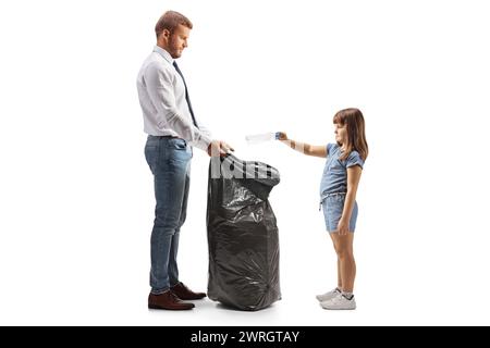 Businessman holding a black waste bag for recycling and child throwing a plastic bottle isolated on white background Stock Photo