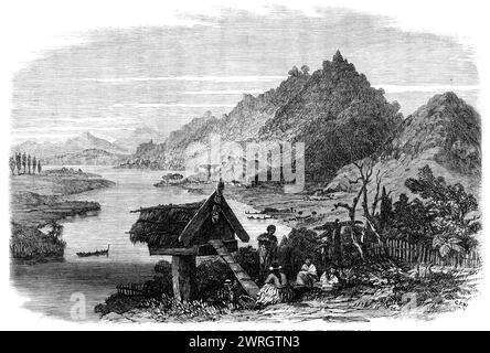 Sketches from New Zealand: scene on the Waikato, near its junction with the Waipa River, 1864. Engraving from a drawing made on the spot by Mr. G. P. Angas, '...representing the picturesque scenery on the Waikato, near its junction with the Waipa River. The Waikato here is broad and deep, and flows majestically along between alluvial plains of the richest soil, which are bounded on the right by the high range of Taupiri. In the distance are seen the mountains of Perongia, near Kawhia, on the west coast. The village on the river bank is called Wakaaepa, and the district around has long been fam Stock Photo