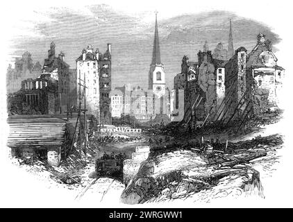 The South-Eastern Railway works on Dowgate-Hill, [London], 1864. Preparations for '...the proposed railway bridge across the Thames, by which the Charing-cross and South-Eastern Railway traffic is to have access to the future City terminus in Cannon-street. The piers and abutments of the bridge are approaching their completion, and much progress has been made with the viaduct...a very large space has been cleared of houses, and the Engraving shows but the last section of the clearings, between Dowgate-hill on the west side and Little Bush-lane on the east, the view being taken from the tramway Stock Photo