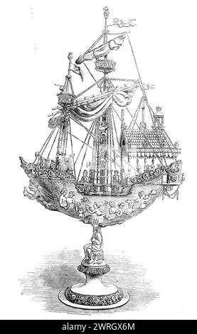 The Loan Collection, South-Kensington, 1862. 'Silver parcel-gilt nef or ship of unusually large dimensions, the body of the ship and above the stand embossed with elaborate ornaments: numerous figures on the deck and on the rigging. Two hallmarks, a shield with two bars and the letters B and D. Height, 2ft. 8&#xbd;in. Captain Leyland'. A nef was a large medieval sailing ship. From &quot;Illustrated London News&quot;, 1862. Stock Photo