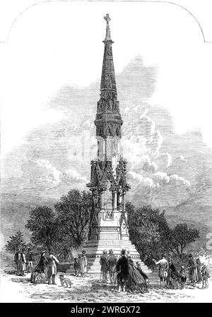 The monument to the late Sir George Cornewall Lewis at New Radnor, [in Wales], 1864. Engraving from a photograph by Mr. Barrar. 'The architect...is Mr. John Gibbs...From his design, and under his superintendence, the monument...has just been completed by Mr. Mansfield. It is...built mainly of Box ground stone. It is 77 ft. high by 25 ft. in width at the base, and is octagonal in form...in four recesses, divided by eight columns, stand, under richly-carved canopies, four allegorical figures...representing Justice, Truth, Oratory, and Literature. The next stage consists of red Mansfield stone, p Stock Photo