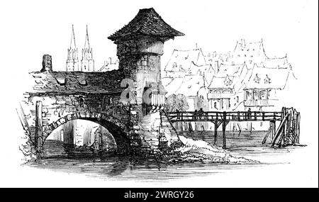 Old bridge, Nuremberg, 1864. '...the Old-world city of Nuremberg...is rich in everything of the past, and owes nothing to the present...To find oneself there is to be thrown back 300 or 400 years, for it is a purely mediaeval city, surrounded by a wide ditch and feudal walls, the latter surmounted...by square and round towers, which are said to have been originally 365 in number. The streets speak of a generation long passed away. Here the eye rests on some gorgeous oriel of the most exquisite tracery; here, as we look up, we see the high-pitched roofs, with story on story of pointed dormers; Stock Photo