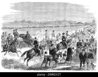 Returning from the races at Cairo, 1864. Engraving from a sketch by Mr. Frederick George, '...of a truly English sport held under most un-English conditions...This scene...differs essentially, in the matters of locality and costume, from a return from Epsom or Ascot. The hills in the distance are known as the Mokatem. At the end of the range may be distinguished the citadel, with its grand mosque, the most striking feature in the panorama of Cairo. To this point the multitude, broken into long streams, are making their way. Conspicuous amongst all in this motley assemblage is the glittering ca Stock Photo