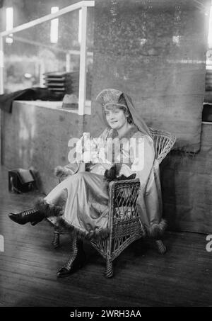 Mildred Tillotson, 1916. Shows Mildred Tillotson holding a doll at a Russian Bazaar held at the 71st Regiment Armory, New York City on Dec. 7-9, 1916. Stock Photo