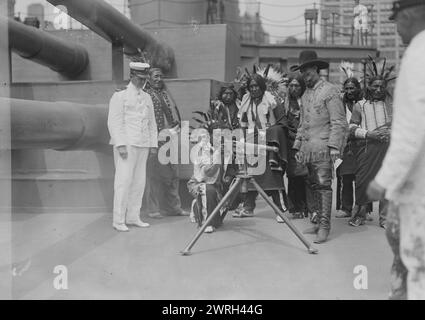 Bald Eagle on U.S.S. Recruit, 28 Jul 1917. Lt. Wells Hawks (1870-1941), a member of the Navy's public relations team with &quot;Chief Bald Eagle&quot; and a group of Native Americans on board the USS Recruit, a wooden mockup of a battleship built in Union Square, New York City by the Navy to recruit seamen and sell Liberty Bonds during World War I. Stock Photo