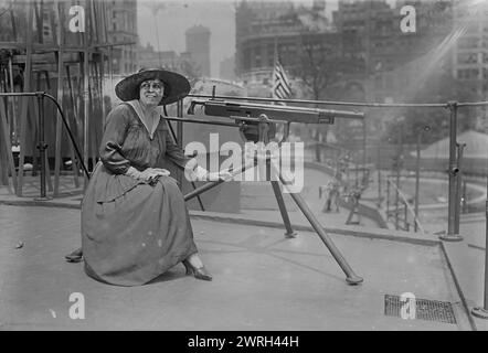 Mabel Garrison, 16 Jul 1917. Soprano opera singer Mabel Garrison Siemonn (1886-1963) with officer and sailors on board the U.S.S. Recruit, a wooden mockup of a battleship built in Union Square, New York City by the Navy to recruit seamen and sell Liberty Bonds during World War I. Stock Photo