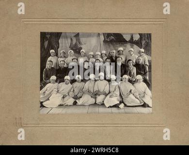 A group of medical students with the teaching staff of the Irkutsk provincial hospital, 1926. From a collection of 136 photographs of Irkutsk from the late nineteenth and early twentieth centuries. The photographs show views of both the city of Irkutsk and countryside of Irkutsk Province; methods of transportation; and the citizenry--including their way of life, social activities, and forms of entertainment. Irkutsk Municipal History Museum Stock Photo