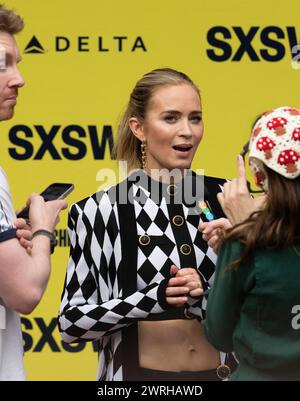 Actress EMILY BLUNT, who plays Jody Moreno in the new movie 'The Fall Guy,' walks the red carpet outside the Paramount Theater in downtown Austin at the movie's world premiere during the South by Southwest (SXSW) film festival on March 12, 2024. Credit: Bob Daemmrich/Alamy Live News Stock Photo