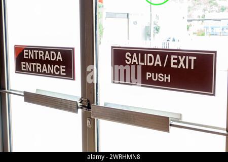 Merida Mexico,Paseo Montejo Avenida Colon,Fiesta Americana Merida hotel,inside interior,lobby door,entrance exit,two 2 languages multiple,bilingual mu Stock Photo