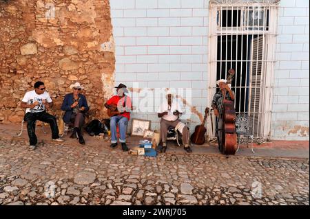 Group of street musicians playing traditional instruments in Cuba, Trinidad, Cuba, Central America Stock Photo