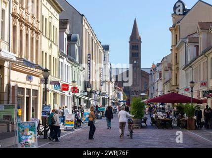 Brandenburger Strasse in Potsdam with the Propsteikirche. Brandenburger Strasse is a pedestrian zone and shopping street in the Dutch quarter of the Stock Photo