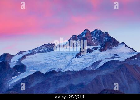 Colourful sky at sunset over the Aiguilles de Tour in the Savoie, France Stock Photo