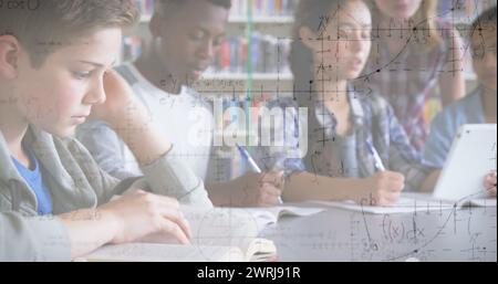 Image of mathematical equations over school children using tablet in classroom Stock Photo
