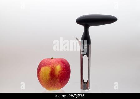 Apple corer. Tool for removing the apple core, isolated on white background. Stock Photo