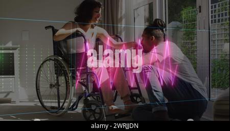 Image of neon heart rate over happy biracial couple, woman on wheelchair Stock Photo