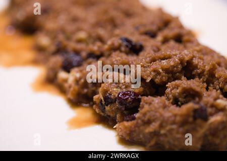 Making of classic strudel fille with apples, cranberries, walnuts and cinnamon Stock Photo