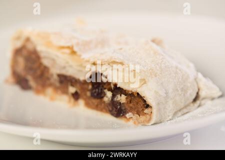 Making of classic strudel fille with apples, cranberries, walnuts and cinnamon Stock Photo