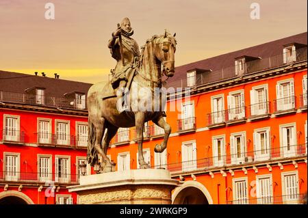 Equestrian statue sculpture monument to King Carlos III, Plaza Mayor in Madrid, Spain. Toned image Stock Photo