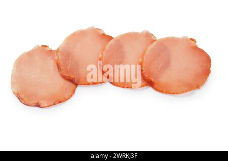 Studio shot of sliced lomo, air dried Spanish pork loin with paprika and garlic cut out against a white background - John Gollop Stock Photo