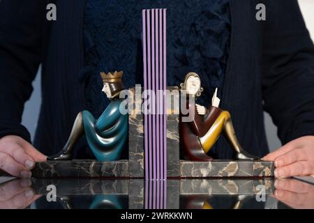 Bellmans, London, UK. 13th Mar, 2024. Bellmans Fine Art Auctioneers preview works from forthcoming sales. Highlights include: Cold painted bronze King and Scholar bookends, c. 1930. Credit: Malcolm Park/Alamy Live News Stock Photo