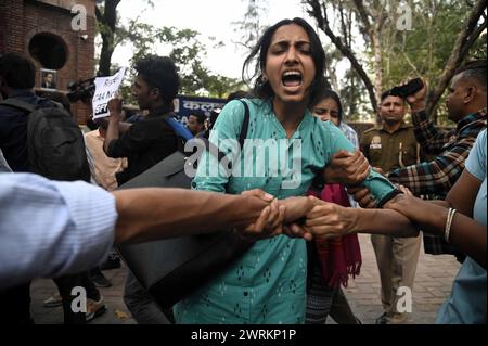 Delhi, New Delhi, India. 13th Mar, 2024. A Protestor gets detained by Delhi Police against the implentation of Citiizenship Amendment Act ( CAA ) in Delhi, India on 13 March, 2024 (Credit Image: © Deep Nair/ZUMA Press Wire) EDITORIAL USAGE ONLY! Not for Commercial USAGE! Stock Photo