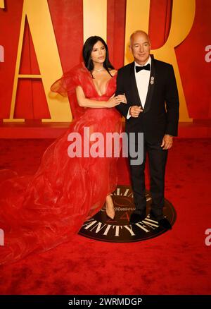 Beverly Hills, California, USA. 10th Mar, 2024. (L-R) Lauren Sánchez and Jeff Bezos attend the 2024 Vanity Fair Oscar Party hosted by Radhika Jones at Wallis Annenberg Center for the Performing Arts on March 10, 2024 in Beverly Hills, California. Credit: Jeffrey Mayer/Media Punch/Alamy Live News Stock Photo