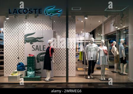 Lacoste Store. Lacoste is a French apparel company that sells high-end clothing, most famously tennis shirts. Minsk, Belarus - March 13, 2024 Stock Photo