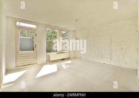 the living room of an empty house with white walls Stock Photo