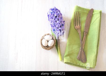 Festive place setting for easter dinner Stock Photo
