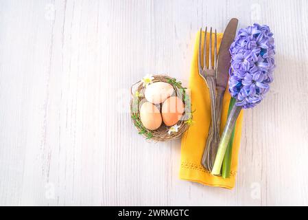 Festive place setting for easter dinner Stock Photo