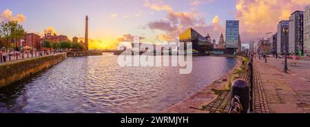 Liverpool, UK - October 07, 2022: Sunset panorama of the Royal Albert Dock, with locals and visitors, in Liverpool, Merseyside, England, UK Stock Photo