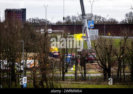 EINDHOVEN - Employees of grid operator Enexis are flaring gas in Eindhoven where a large gas pipeline is in danger of collapsing. Emergency services have closed off the area. The high-pressure gas pipeline is located at the A2 viaduct, near the entrance to the High Tech Campus. ANP ROB ENGELAAR netherlands out - belgium out Stock Photo