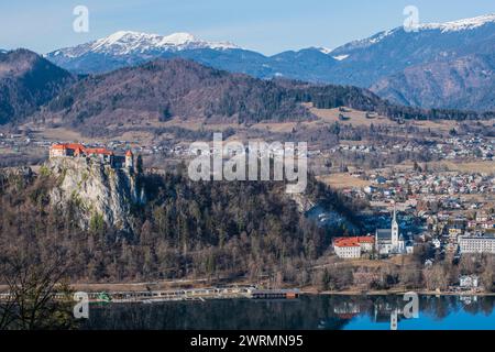 Lake Bled: Bled Castle and St. Martina Parish Church, with Julian Alps in the background. Slovenia. Stock Photo