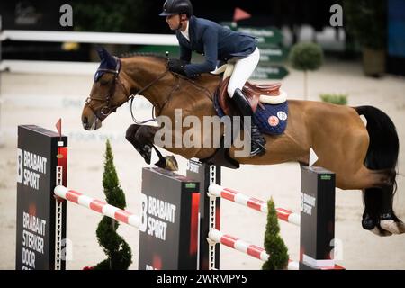 DenBosch, Netherlands - March 9, 2024. Ben Maher from Great Britain riding Faltic HB compete in the 1.50m class at the 2024 Rolex Dutch Masters. Stock Photo