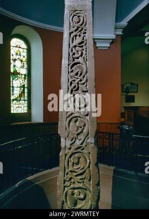 An early C8th Anglian preaching & teaching cross placed in the sunken-floored apse of Ruthwell Parish Church, Dumfries and Galloway, Scotland, UK. Stock Photo