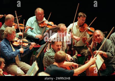 string players of the Czech Philharmonic Orchestra rehearsing for a concert of music by Smetena & Mahler conducted by Charles Mackerras in the Usher Hall as part of the Edinburgh International Festival on 04/09/1998 Stock Photo