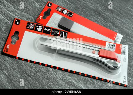 Hamburg, Germany -  March  12  2024: Carpet cutter easy pro knife isolated on white background Stock Photo