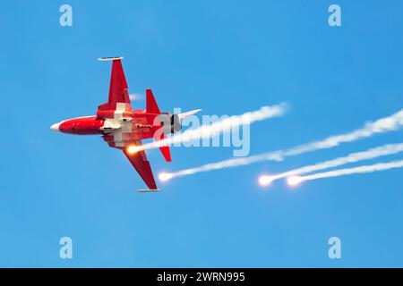 Radom, Poland - August 27, 2023: Swiss Air Force F-5E Tiger fighter jet plane flying. Aviation and military aircraft. Patrouille Suisse aerobatic team Stock Photo