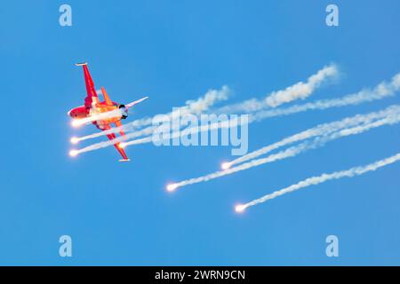 Radom, Poland - August 27, 2023: Swiss Air Force F-5E Tiger fighter jet plane flying. Aviation and military aircraft. Patrouille Suisse aerobatic team Stock Photo