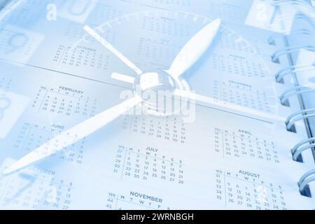 Clock face and calendar page Stock Photo